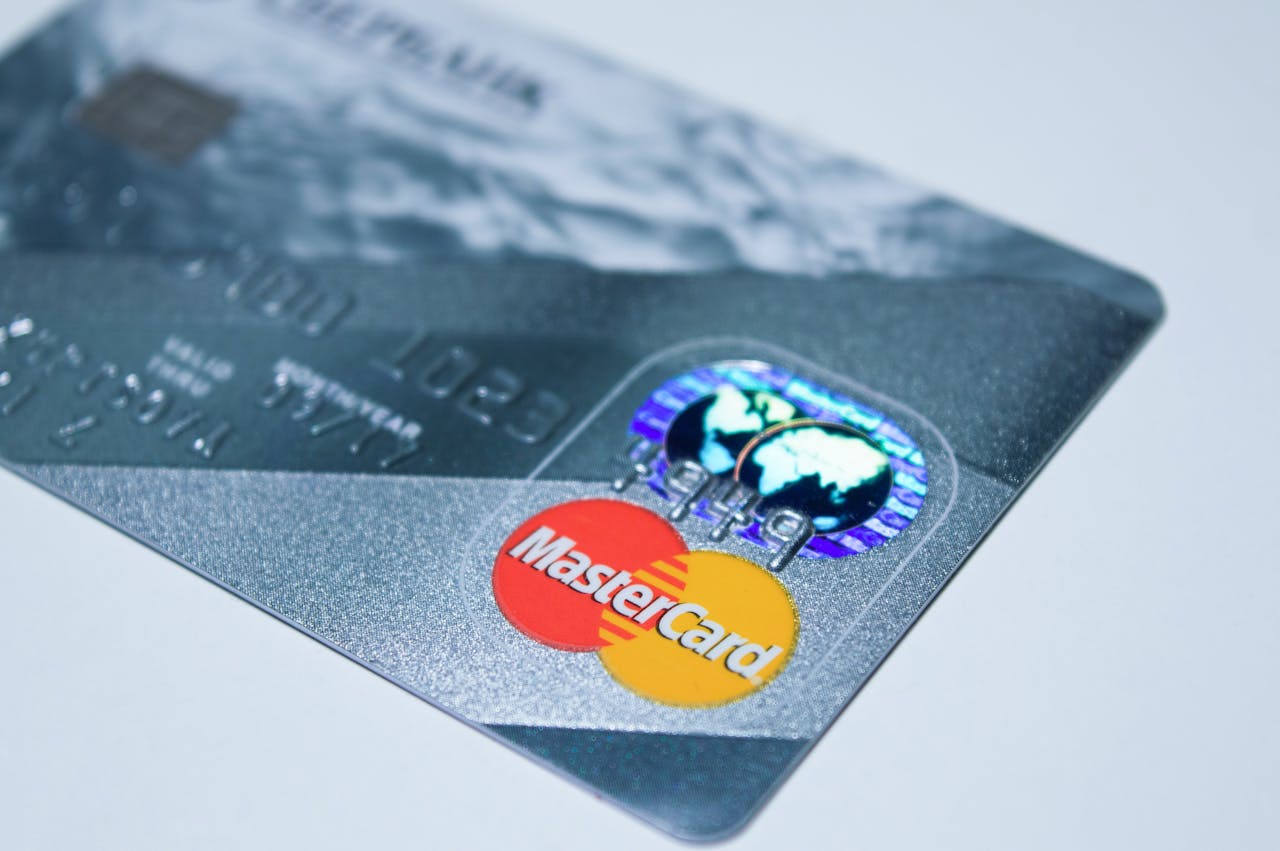 creative-03 Detail shot of a MasterCard credit card, showing the chip and logo.